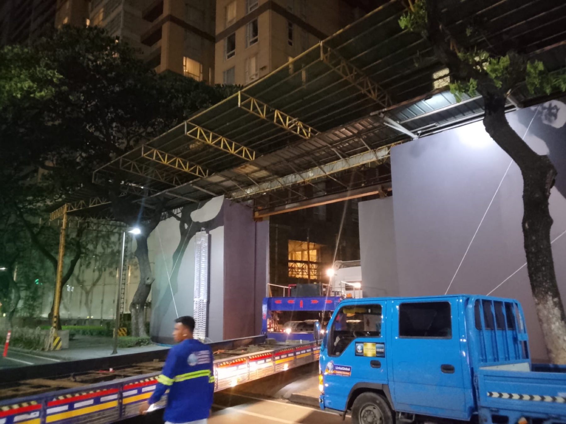 Construction-cargo delivery at The Estate Makati at night