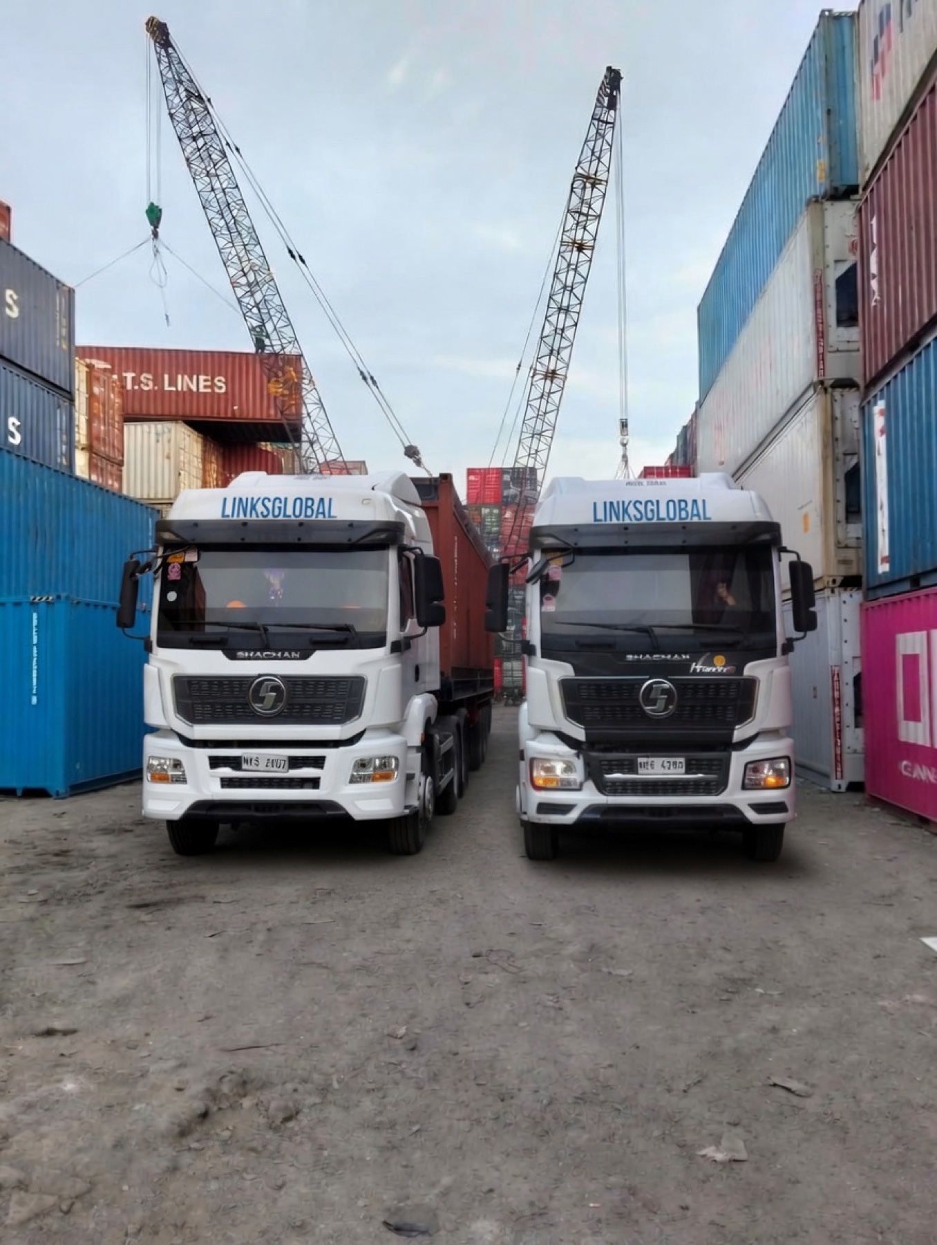 Two LinksGlobal trucks at a container yard